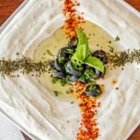 Labneh · Blended with garlic and dried  mint , and dried yogurt.