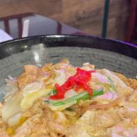 Oyako Don · Chicken, egg, and onions simmered together in a house sauce over rice.