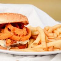 Western Bacon Cheeseburger · BBQ sauce, fried onion rings, bacon and Swiss cheese.