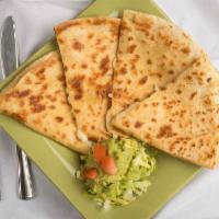 Quesadilla · Melted cheese and guacamole. Make it vegetarian or add choice of protein.