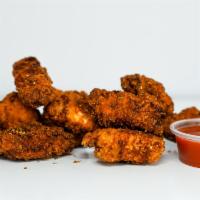 Crispy Boneless Wings · Crispy boneless wings with celery and carrot sticks, fries, homemade buttermilk ranch and bl...