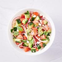 Cucumber Tomato Salad · Ripe cucumbers and tomatoes with fresh basil, balsamic vinegar, sliced red onion, and crumbl...