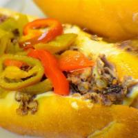 Mushroom Philly Cheese Steak · Steak or Chicken with sautéed mushrooms, White American Cheese, grilled onions, hot and / or...