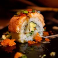Baked Salmon Roll · In: cream cheese, avocado, gobo
Out: salmon, dynamite sauce, green onion, masago