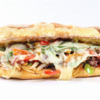 Original Philly Cheesesteak · Thinly sliced steak, grilled mushrooms, peppers, onion, and cheese on a fresh baked Italian ...
