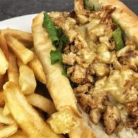 Chicken Cheesesteak · Grilled chicken, grilled mushrooms, peppers, onion, and cheese on a fresh baked Italian roll.