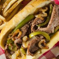 Jalapeño Philly Cheesesteak · Thinly sliced juicy steak with onion, jalapeños, mushrooms, green pepper, melted cheese and ...