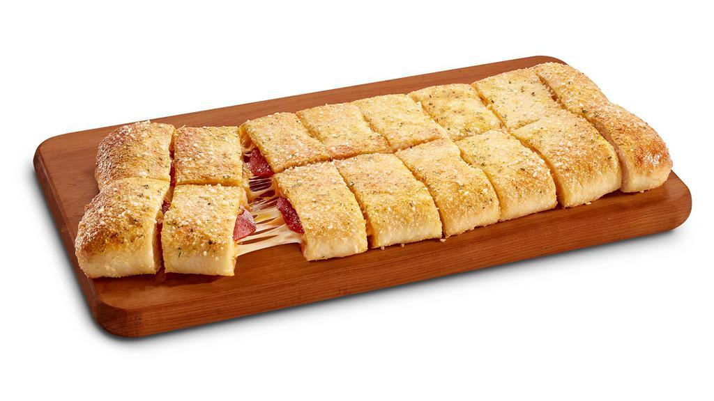 Pepperoni Stuffed Howie Bread® · 16 bread sticks stuffed with mozzarella, cheddar & pepperoni, topped with garlic herb seasoning & Parmesan. 100 calories per piece.
