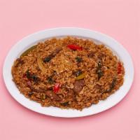 Beef Spicy Basil Fried Rice · Wok fried rice tossed with beef, basil, chili, and peppers.