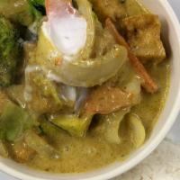 Green Curry · Eggplant, bamboo shoot, green beans, bell pepper, and basil in coconut milk.