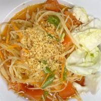 Papaya Salad · Thai or Lao's Style. Shredded papaya, carrot, green bean, peanuts, and lime juice.