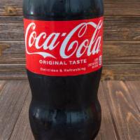 2 Liter Soda · Choice of coke, sprite, strawberry, or orange.