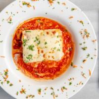 Lasagna Bolognese · Traditional lasagna with beef, tomato sauce, mozzarella & bechamel sauce.
