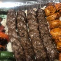 Mix Family Special #3 (4Ppl) · Chicken Kabab, Beef Kafta (Lula), served with rice, house salad, hummus, mutable, tazziki, g...