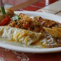 Two Enchiladas & Taco · A classic combination made even better. Two enchiladas topped with your choice of sauces and...