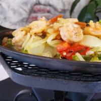 Prawns Fajitas · Large, fresh prawns marinated in our homemade achiote sauce, sauteed with red and green bell...
