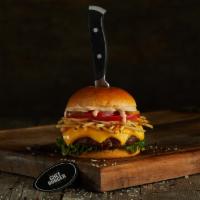 Frita Burger · Black Angus ground beef burger on a brioche bun topped with cheddar, lettuce, tomatoes, whit...