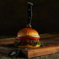 Chef'S House Burger · Black Angus ground beef burger on a brioche bun topped with lettuce, tomatoes, white onions,...