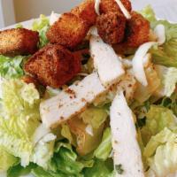 Chicken Caesar Salad · Grilled Chicken, Baby Romaine, Parmigiano, Croutons, House made Caesar Dressing.