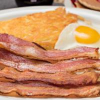 Big Breakfast Combos · Two eggs any style, choice of sausage, bacon, ham or corned beef hash, country potatoes or h...