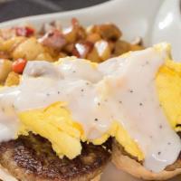 Country Skillet · Country sausage piled  on a scratch-made biscuit with scrambled eggs topped with Cheddar che...