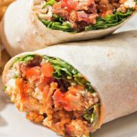 Buffalo Bleu Wrap · Crispy chicken tossed in our buffalo sauce, wrapped in a flour tortilla with lettuce, tomato...