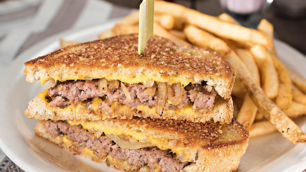 Patty Melt · Sautéed onions and American cheese on grilled rye bread.