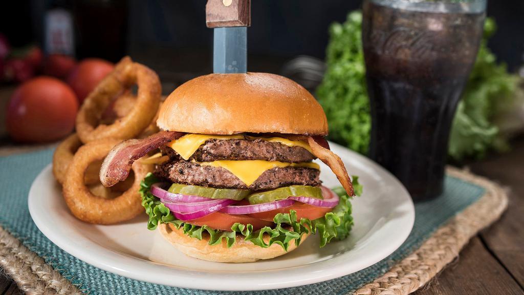 Double Bacon Cheeseburger · Just take a look - crisp bacon, two slices of Cheddar cheese and two burger patties.