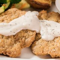 Chicken Fried Steak · Perkos Cafe favorite: A half pound topped with country gravy.