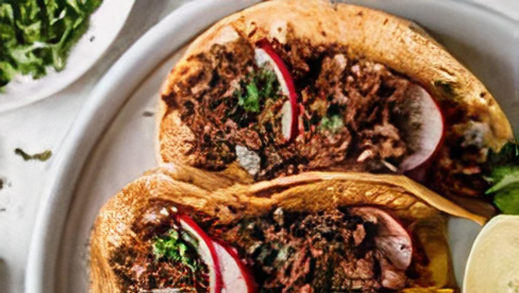 Crispy Grilled Barbacoa Taco · Crispy grilled taco served with juicy barbacoa and grilled onions.