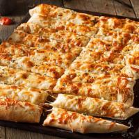 Gluten-Free Cheesy Bread Sticks · Gluten free. Gluten-free breadsticks seasoned with herbs and olive oil and served with marin...