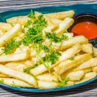 Truffle Fries · Shoestring fries tossed in truffle oil, garlic, and Parmesan.
