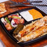 Plate · Your choice of protein, two spreads served with Dolma and pita, and choice of fries (with Se...