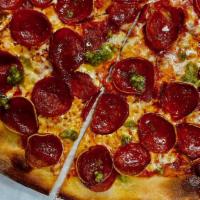 Pesto-Roni Pizza (X-Large) · Thin Crust Pizza, Fresh Mozzarella, double Pepperoni, drops off Pesto sauce on top.