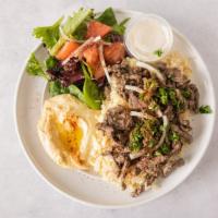 Shawarma · Shredded marinated top sirloin beef served with tahini sauce.