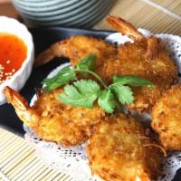 Coconut Shrimp · Crispy battered shrimps coated with coconut flakes, served with Thai sweet chili sauce. (6 p...
