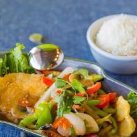 Ginger Fish · Deep-fried white fish filet topped with mushroom, ginger, onion, bell pepper, and a light sa...