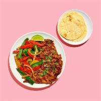 Fajitas · Your choice of meat with sauteed onions and peppers. Served with rice, beans, and 3 corn tor...