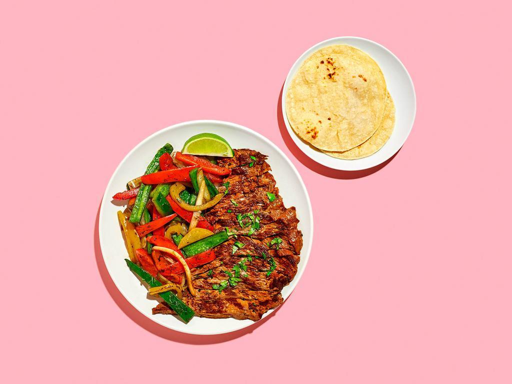 Fajitas · Your choice of meat with sauteed onions and peppers. Served with rice, beans, and 3 corn tortillas.