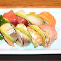 Rainbow Roll · Cucumber, avocado, kani topped tuna, salmon, white fish.