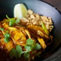 Pad Thai · Rice vermicelli noodles stir fried in tamarind sauce, with egg, beansprouts, green onions, c...