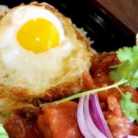 Khao Moo Kob Moo Dang · Crispy pork belly and roasted pork over rice and topped with Thai gravy, fried egg cucumber.