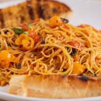 Angel Hair Checca · With garlic bread. Fresh tomatoes, basil, garlic, and olive oil.