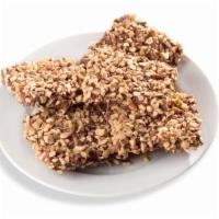 English Toffee · 2 Mountain-sized pieces of crisp, buttery toffee enrobed in milk or dark chocolate, covered ...