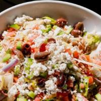 Greek Orzo Salad · Toasted orzo, feta cheese, fennel, cucumbers, red onion, tomatoes and olives over chopped ro...