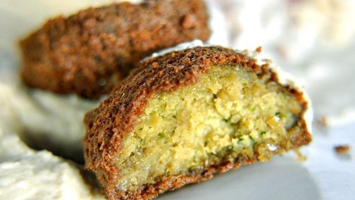 Falafel   · 4pcs. Deep-fried vegetarian patties made from chickpeas, fava beans, vegetables and spices.