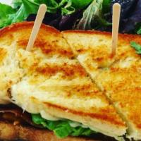 Gourmet Grilled Cheese · Prosciutto, Swiss, Cheddar, arugula, and tomato.