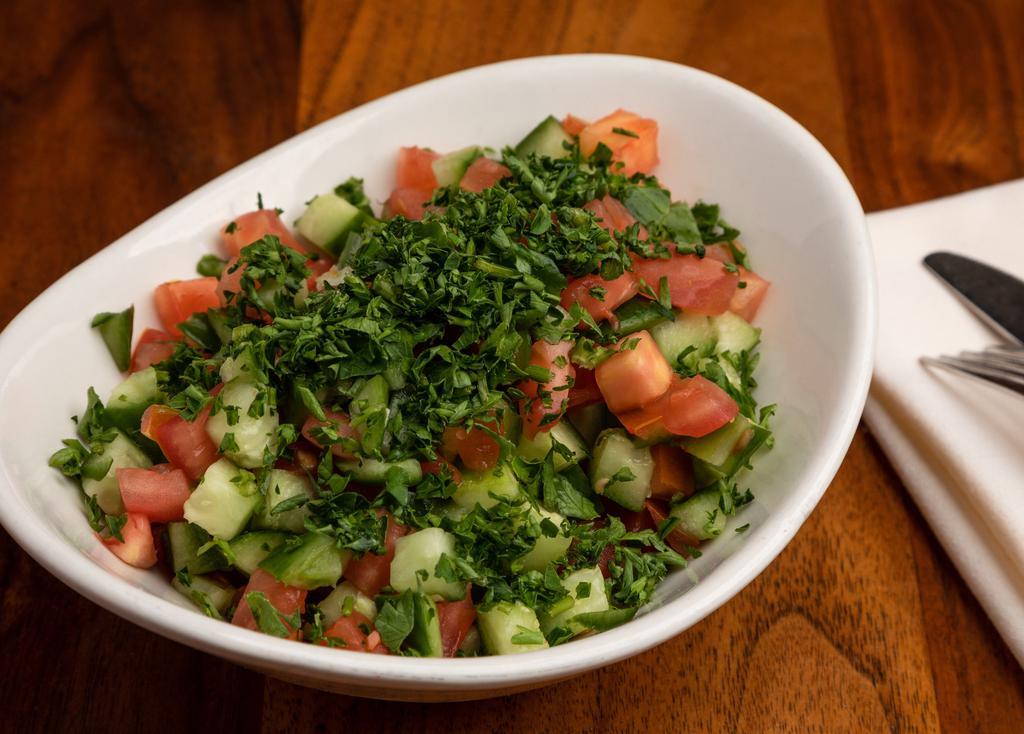 Shirazi · Gluten free, vegetarian. Persian cucumber, roma tomatoes, parsley w/ house dressing.