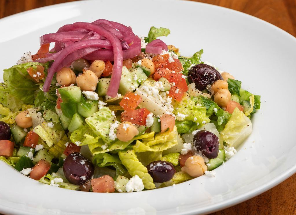 Mediterranean Salad · Vegetarian, gluten free. Romaine, Persian cucumbers, tomatoes, pickled red onions, garbanzo beans, black olives, feta cheese, champagne vinaigrette dressing. Add chicken for an additional charge.