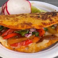 Veggie Quesadilla · Grilled red, green, and yellow bell peppers with onions. Topped with cilantro, onions, and h...